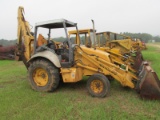 New Holland555E backhoe