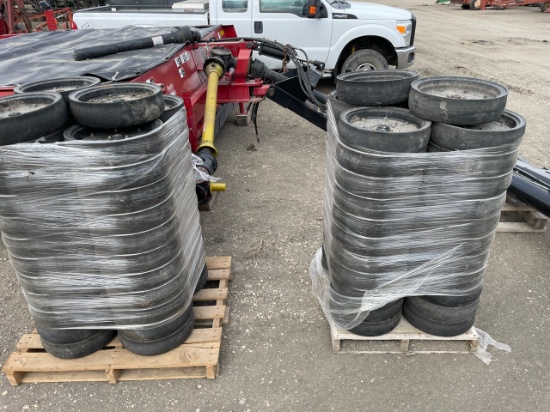 Pallet of JD planter Wheels