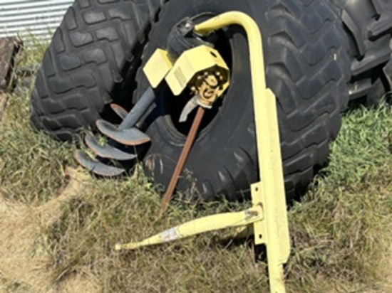 Three point post hole digger auger has some damage