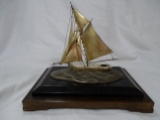 Sterling Silver Ship on Wood Base.