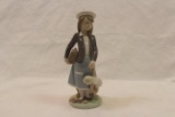 Lladro Figurine Girl With Doll and Purse.