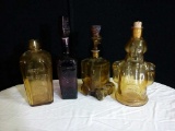 Set Of 4 Vintage Colored Glass Decanters