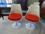 Pair Of Molded Plastic Chairs.