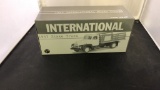 1957 International Stake Truck Die-Cast Replica.