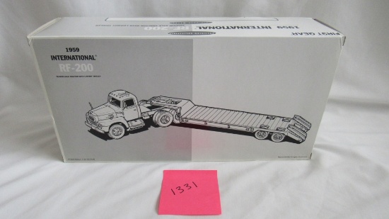 1959 International RF-200 Tandem Axle Tractor With Lowby Trailer Die-Cast Replica.