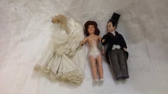 Vintage Bride and Groom Dolls with sleepy eyes.