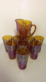 Carnival Glass Pitcher and 8 Glasses.