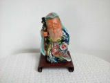 Asian Figurine with Stand