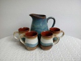 Stoneware 4 cups and a Pitcher
