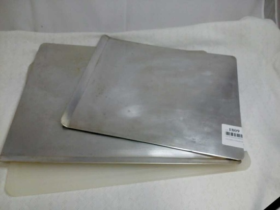 LOT OF BAKING SHEETS AND CUTTING BOARD