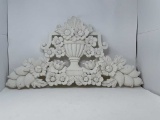 CEMENT WALL HANGING OF FLOWERS IN AN URN