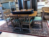 OAK TABLE AND 6 CHAIRS WITH 4 LEAVES.