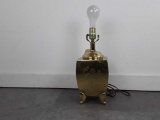BRASS COLORED METAL LAMP W/ASIAN ENGRAVED MOTIF