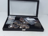 Glass case of 9 pristine geodes & 6 slated rock