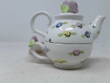 MATCHING TEACUP AND TEAPOT BY HAND & HEART INC.