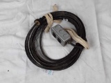 Electrical extension cord with double outlet box.