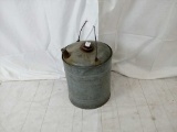 Galvanized steel oil can.