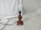 Small red Victorian lamp with no shade