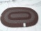 Brown and Grey Oval Rug.