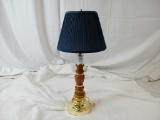 OAK TABLE LAMP WITH BRASS BANDS AND HARDWARE.