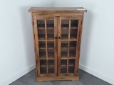 Mission style oak shelf with glass doors