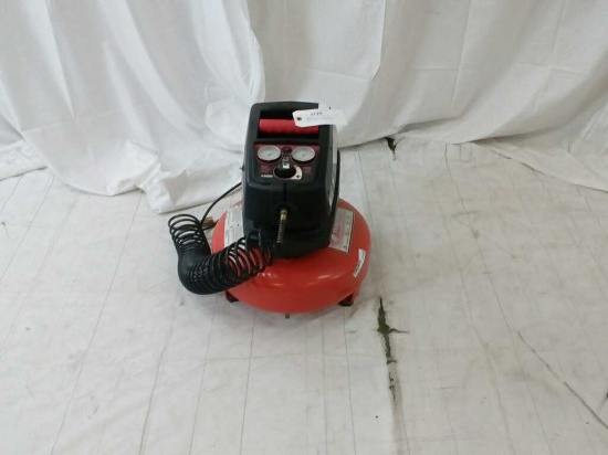 HUSKY AIR COMPRESSOR - USED - HOLDS 4 GALLONS