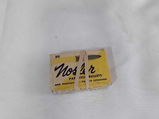 1 Box of Nosler 30 Cal Bullets.