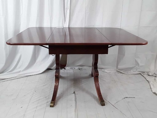 DROP LEAF DINING TABLE BRASS CAP FEET