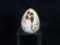 HAND-PAINTED PORCELAIN EGG WITH A CANDLE CUTOUT