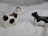 2 VINTAGE WHITE AND BLACK COW CREAMERS