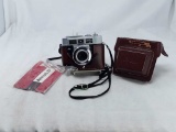 KODAK MOTORMATIC 35F CAMERA WITH STRAP AND MANUAL