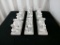 6 DECORATIVE WHITE CERAMIC VASES ON PLATE