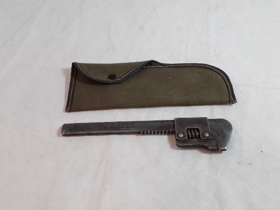 VINTAGE WRENCH IN A MILITARY GREEN POUCH