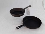 2 CAST IRON SKILLETS,