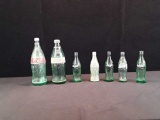 7 VTG COCA COLA BOTTLES.6.5OZ,1 LITER & 32 OZ