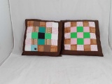 PAIR OF MATCHING BROWN QUILTED PILLOWS