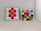 PAIR OF MATCHING CYAN QUILTED PILLOWS