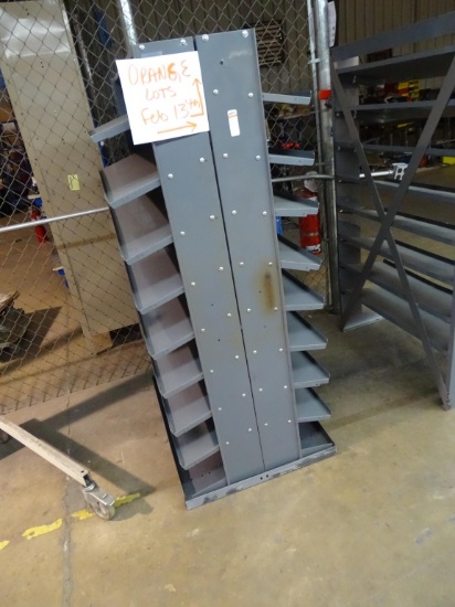 GREY METAL STATIONERY SHELVING.