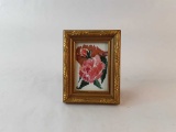 SMALL FRAMED FLORAL PICTURE.