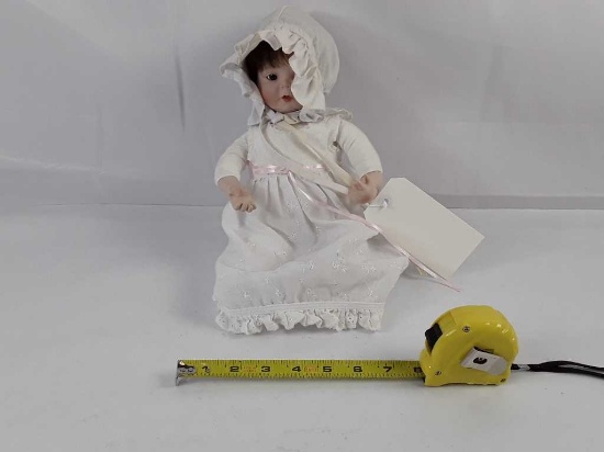 PORCELAIN BABY DOLL IN WHITE DRESS