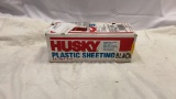Box of Husky Black Plastic Sheeting.