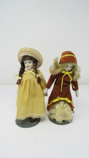 SET OF TWO SMALL BISQUE DOLLS