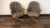 PAIR OF ROLLING CHAIRS / WOOD FRAME