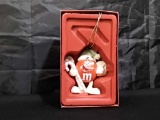 LENOX M&M'S RED CHARACTER ORNAMENT.