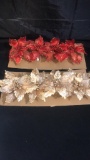 4 RED & 4 IVORY POINSETTA CLIPS.