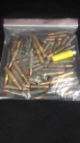 1 BAG OF MISC RIFLE AMMO.