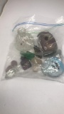 BAG OF STOPPERS AND THREE SMALL VILE BOTTLES