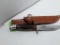 OFFICIAL BOY SCOUTS OF AMERICA KNIFE WITH SHEATH.