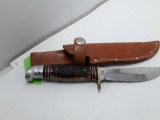 OFFICIAL BOY SCOUTS OF AMERICA KNIFE WITH SHEATH.