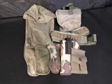 COLLECTION OF MILITARY HOLSTERS BELTS & MORE.